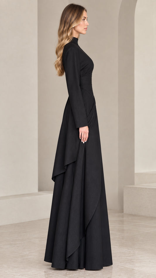 Side profile of black long sleeve floor-length evening gown
