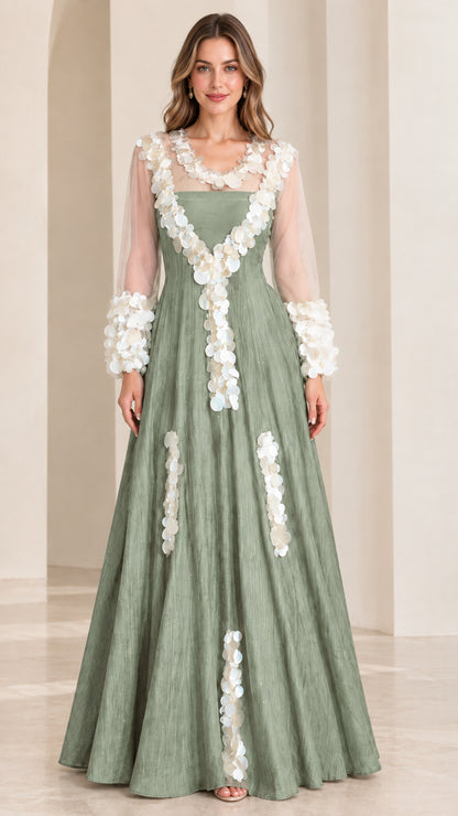 Front full-length view of sage green maxi evening dress with sheer illusion neckline and 3D petal details
